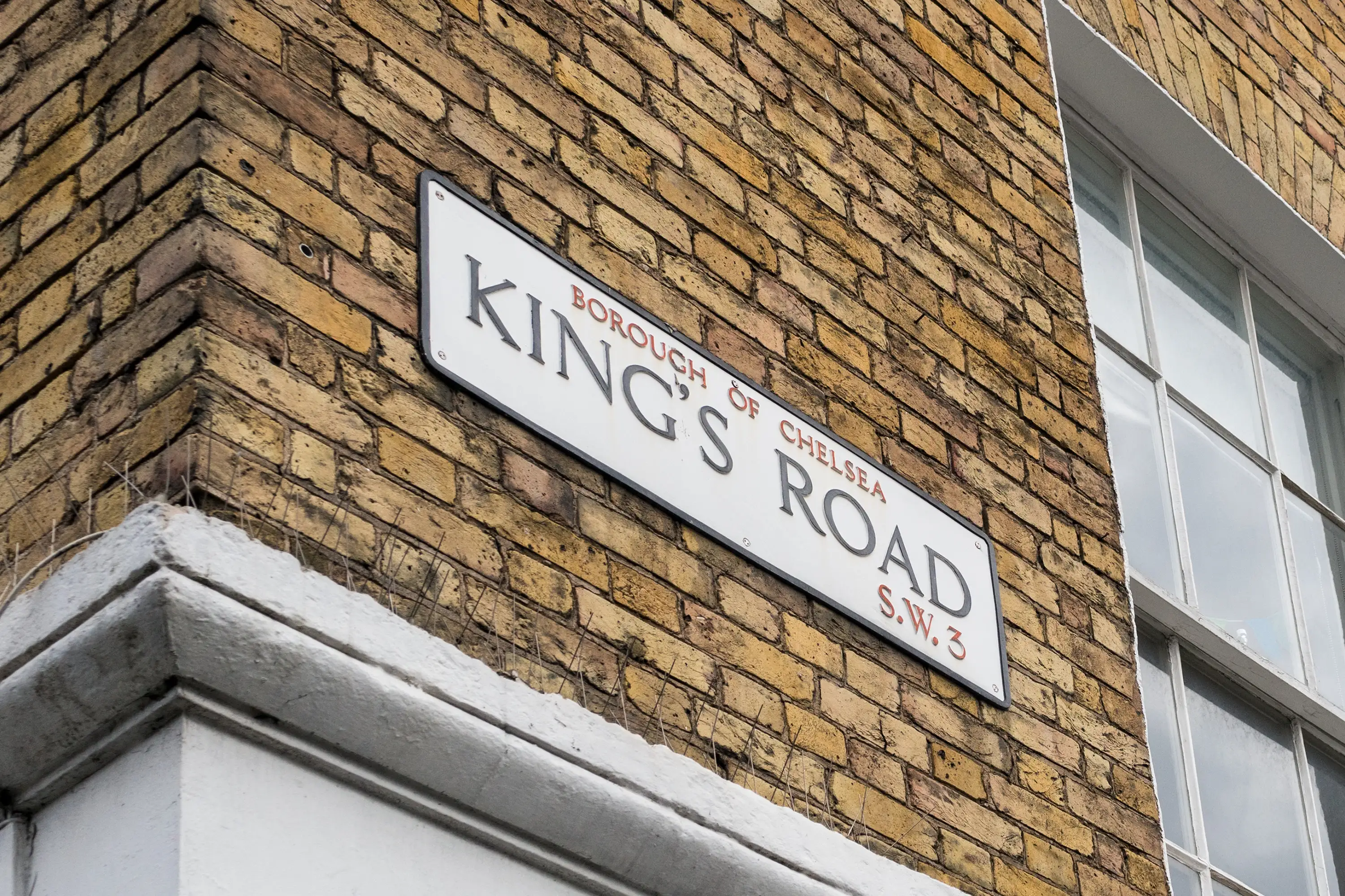Kings Road road sign on a brick wall
