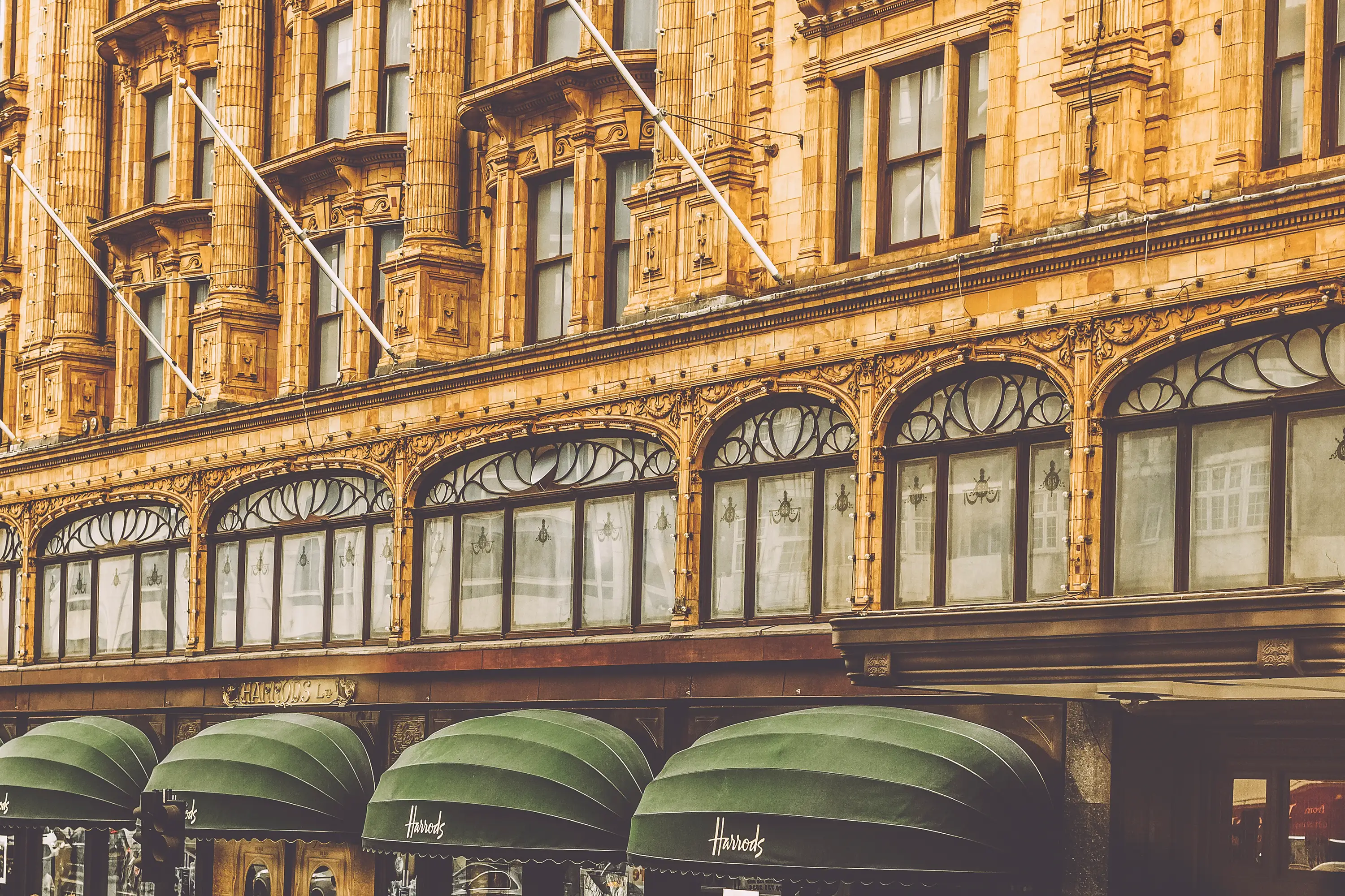 Close up Harrods windows and canopy's